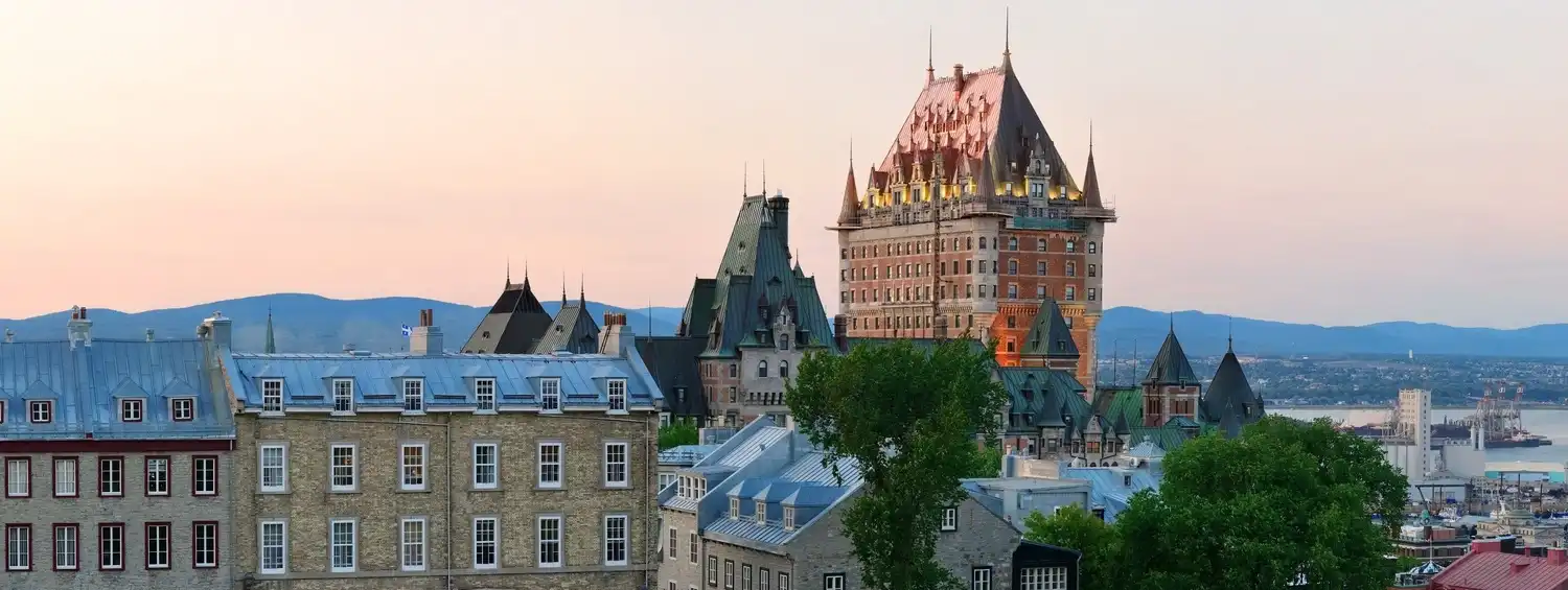 Students collaborating in a modern classroom with laptops